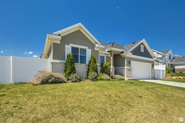 7518 S 5720 W, West Jordan, UT 84081 - view of front of house with fence, brick siding, and a front yard