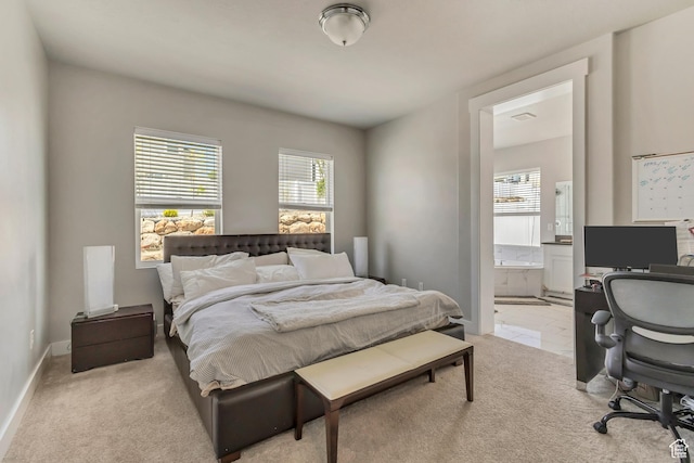 7518 S 5720 W, West Jordan, UT 84081 - bedroom with light carpet, ensuite bath, baseboards, and multiple windows