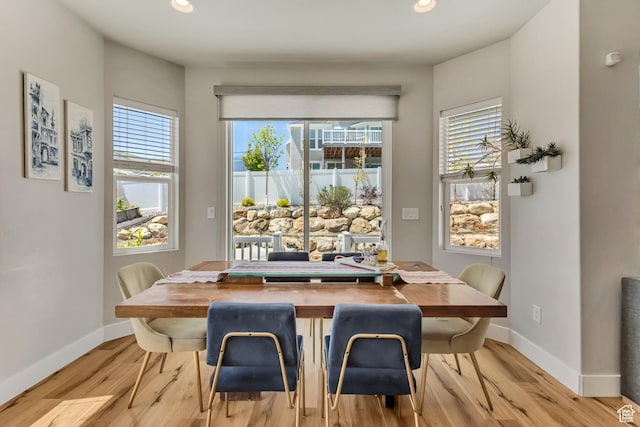 7518 S 5720 W, West Jordan, UT 84081 - dining area with a wealth of natural light, baseboards, and light wood-style floors