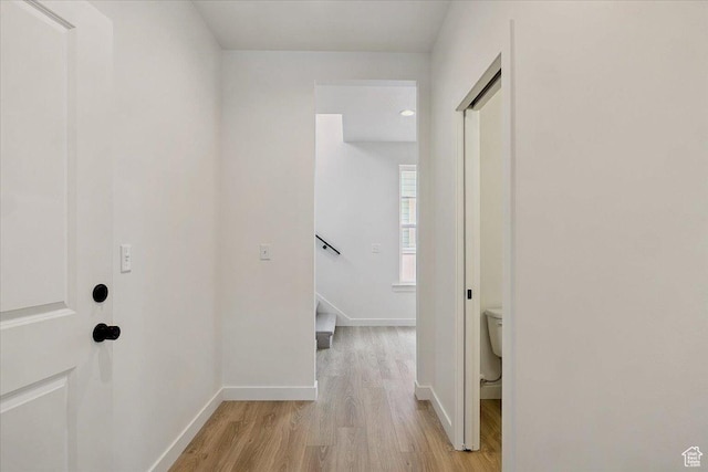 6768 W Docksider Dr Unit 298, South Jordan, UT 84009 - corridor with light wood-type flooring and baseboards
