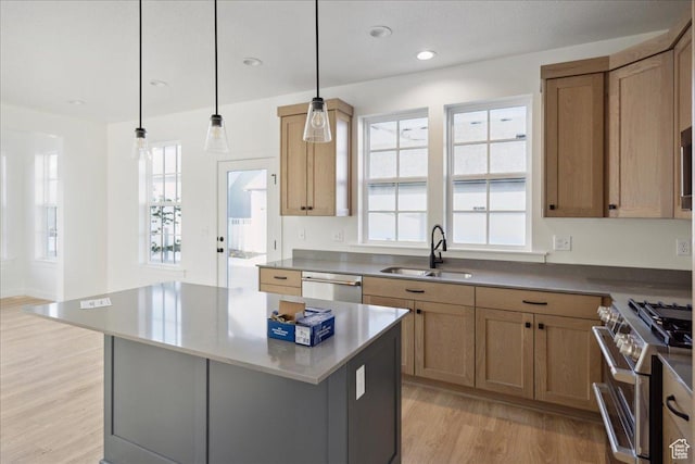 6768 W Docksider Dr Unit 298, South Jordan, UT 84009 - kitchen with a sink, stainless steel appliances, light wood-type flooring, a kitchen island, and plenty of natural light