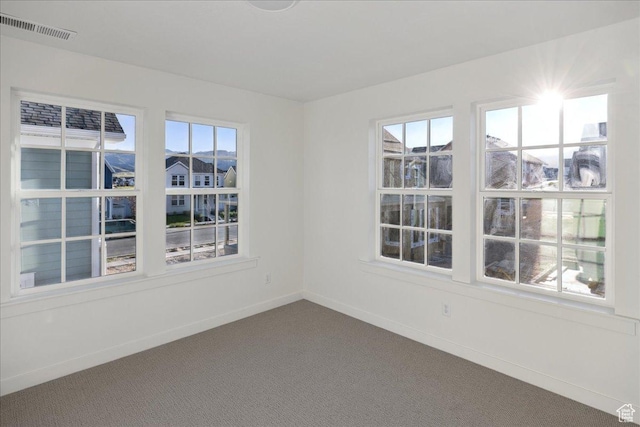 6768 W Docksider Dr Unit 298, South Jordan, UT 84009 - empty room with dark colored carpet and baseboards