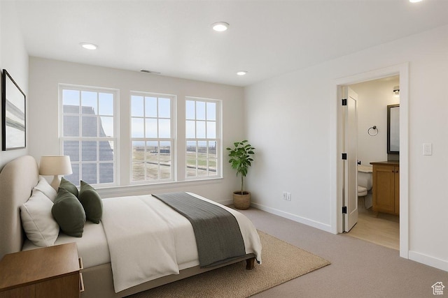 6768 W Docksider Dr Unit 298, South Jordan, UT 84009 - bedroom with carpet flooring, multiple windows, recessed lighting, and ensuite bath