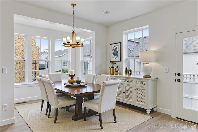 6768 W Docksider Dr Unit 298, South Jordan, UT 84009 - dining room featuring light wood-style flooring, a chandelier, and recessed lighting