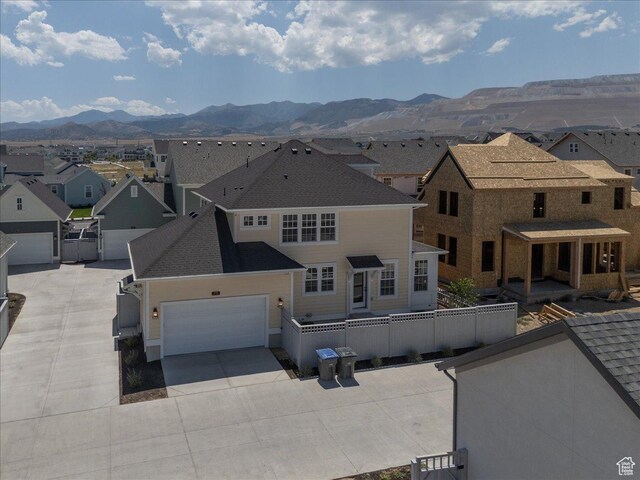6768 W Docksider Dr Unit 298, South Jordan, UT 84009 - aerial perspective of suburban area featuring a mountainous background