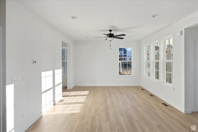 6768 W Docksider Dr Unit 298, South Jordan, UT 84009 - unfurnished room featuring light wood-style floors, baseboards, and ceiling fan