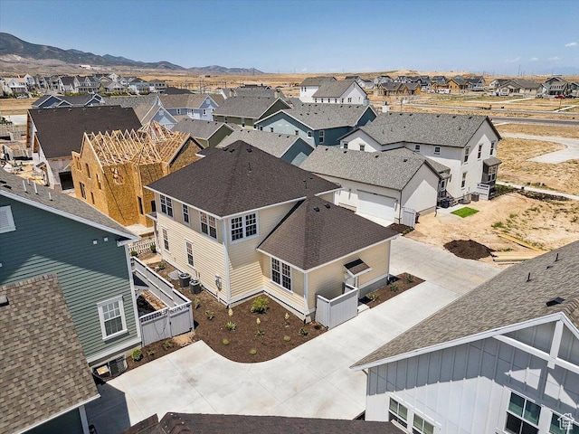 6768 W Docksider Dr Unit 298, South Jordan, UT 84009 - aerial perspective of suburban area featuring a mountainous background