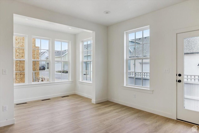 6768 W Docksider Dr Unit 298, South Jordan, UT 84009 - interior space with light wood finished floors and plenty of natural light