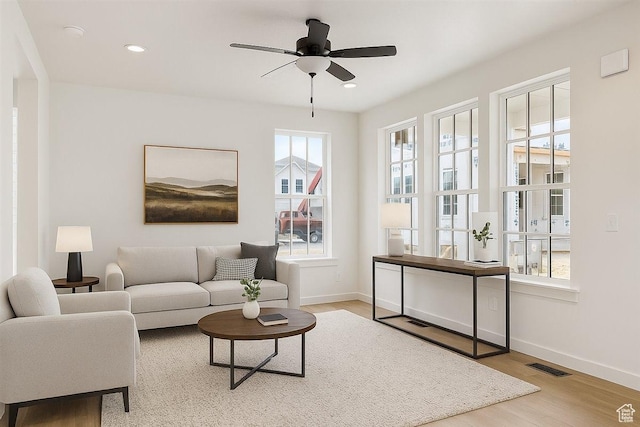 6768 W Docksider Dr Unit 298, South Jordan, UT 84009 - living room with wood finished floors, a ceiling fan, and recessed lighting