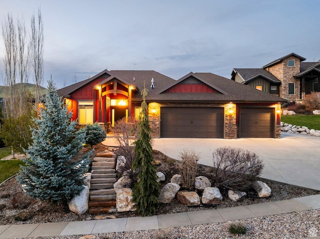 3440 Greenfield Cir, Mountain Green, UT 84050 - craftsman house featuring concrete driveway, board and batten siding, a garage, and stone siding