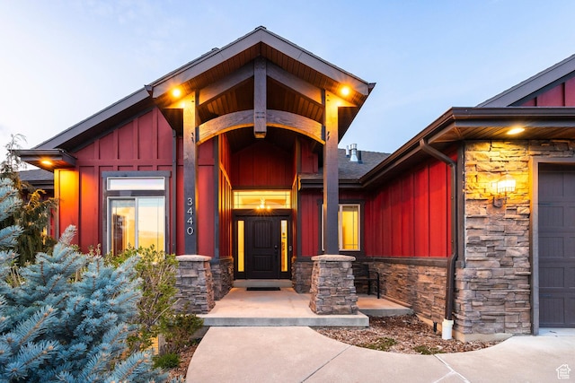 3440 Greenfield Cir, Mountain Green, UT 84050 - entrance to property featuring stone siding and board and batten siding