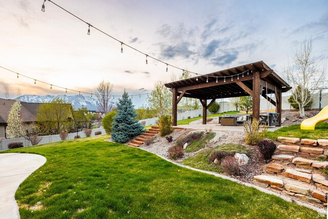 3440 Greenfield Cir, Mountain Green, UT 84050 - view of yard with a patio area, a playground, a pergola, and fence