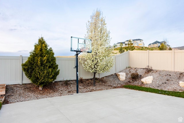 3440 Greenfield Cir, Mountain Green, UT 84050 - view of sport court with basketball court and a fenced backyard
