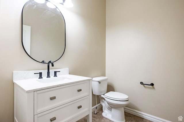 3440 Greenfield Cir, Mountain Green, UT 84050 - bathroom featuring vanity, toilet, baseboards, and tile patterned floors
