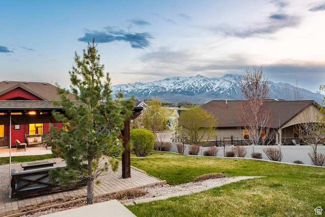 3440 Greenfield Cir, Mountain Green, UT 84050 - view of yard featuring fence, a patio, an outdoor living space, and a mountain view
