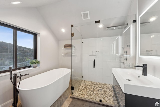 7515 Stagecoach Dr, Park City, UT 84098 - full bathroom featuring a freestanding bath, a stall shower, vanity, vaulted ceiling, and recessed lighting