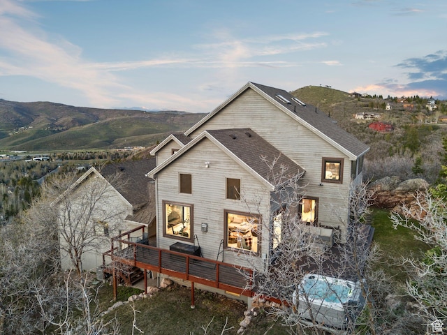 7515 Stagecoach Dr, Park City, UT 84098 - rear view of house featuring a deck with mountain view