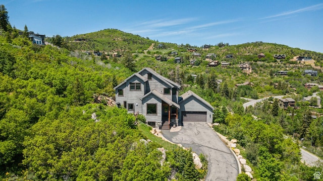 7515 Stagecoach Dr, Park City, UT 84098 - view of front of house featuring a mountain view and a garage