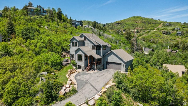 7515 Stagecoach Dr, Park City, UT 84098 - view of front of property featuring a garage and driveway