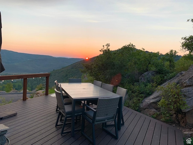 7515 Stagecoach Dr, Park City, UT 84098 - deck at dusk with outdoor dining area and a mountain view