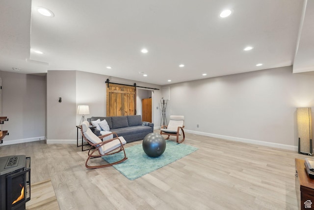 7515 Stagecoach Dr, Park City, UT 84098 - living area with a barn door, light wood-type flooring, and recessed lighting