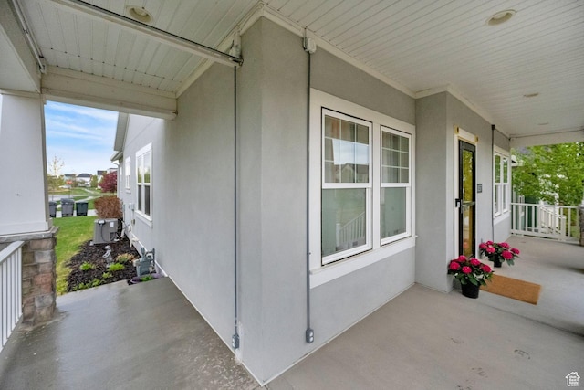 10557 S Pipestone Way S, Jordan, UT 84009 - view of property exterior with central AC unit and a porch
