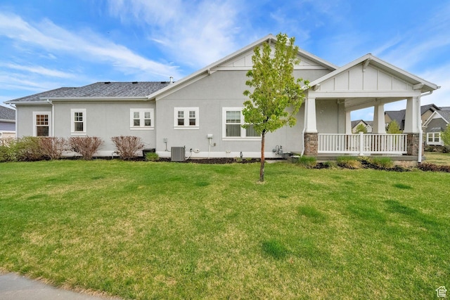 10557 S Pipestone Way S, Jordan, UT 84009 - back of property with a porch, stucco siding, a yard, and central AC unit