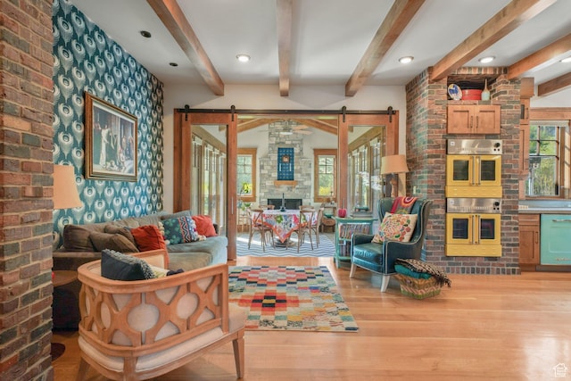1608 W 1970 N, Provo, UT 84604 - living room with a barn door, wood finished floors, and beamed ceiling