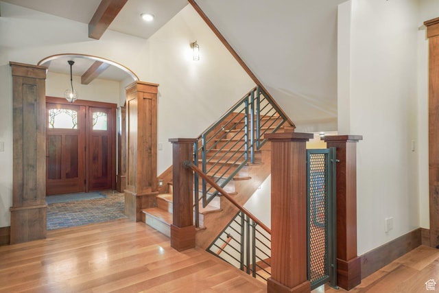 1608 W 1970 N, Provo, UT 84604 - entryway featuring wood finished floors, arched walkways, beam ceiling, and stairs