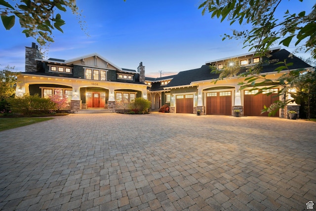 1608 W 1970 N, Provo, UT 84604 - craftsman-style home with stone siding, french doors, decorative driveway, and a chimney