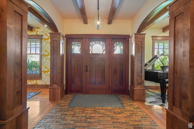 1608 W 1970 N, Provo, UT 84604 - foyer entrance featuring brick flooring, beam ceiling, and decorative columns