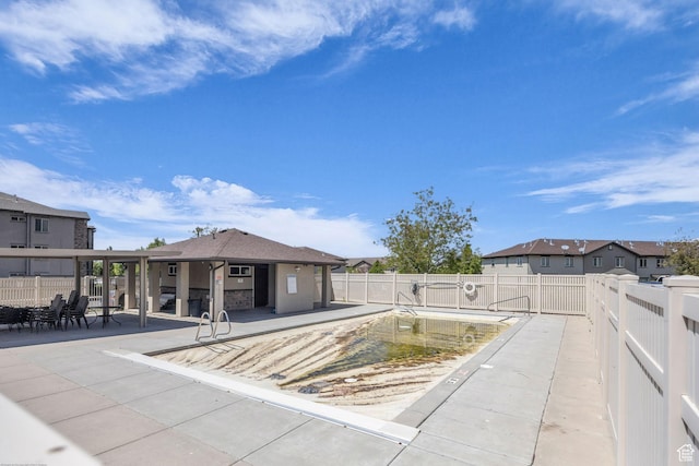 282 W 605 N Unit 307, Centerville, UT 84014 - exterior space with a patio, a residential view, fence, and a community pool