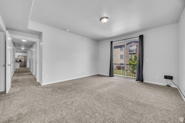 282 W 605 N Unit 307, Centerville, UT 84014 - carpeted empty room featuring baseboards and a textured ceiling
