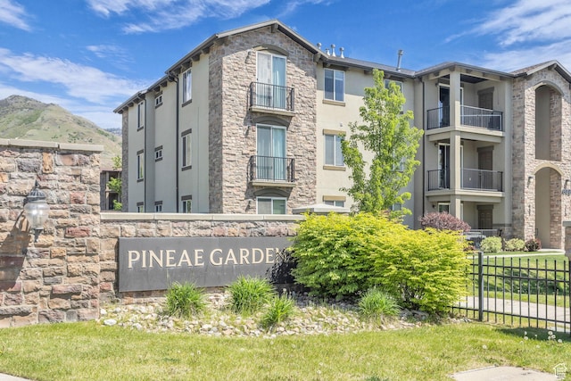 282 W 605 N Unit 307, Centerville, UT 84014 - community sign featuring a mountain view and fence