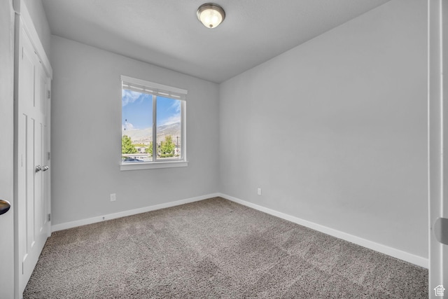 282 W 605 N Unit 307, Centerville, UT 84014 - unfurnished bedroom with baseboards and carpet floors