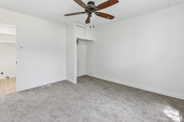 390 E Vine, Tooele, UT 84074 - unfurnished bedroom with a closet, baseboards, ceiling fan, visible vents, and carpet floors