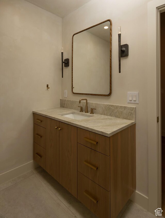 7370 N Buckboard Dr, Park City, UT 84098 - bathroom featuring baseboards and vanity