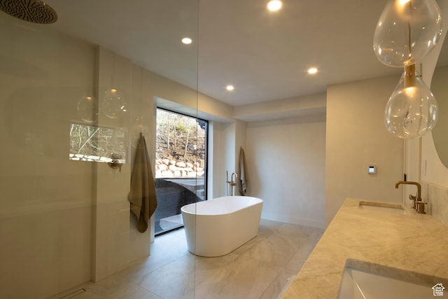 7370 N Buckboard Dr, Park City, UT 84098 - full bathroom with a soaking tub, double vanity, recessed lighting, and a sink
