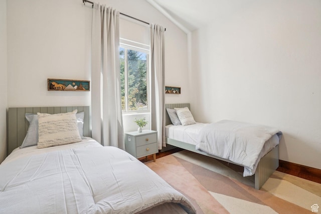 12221 Ross Creek Dr Unit 137, Kamas, UT 84036 - bedroom with lofted ceiling and wood finished floors