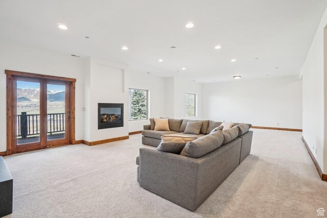 12221 Ross Creek Dr Unit 137, Kamas, UT 84036 - living room with light carpet, baseboards, and recessed lighting