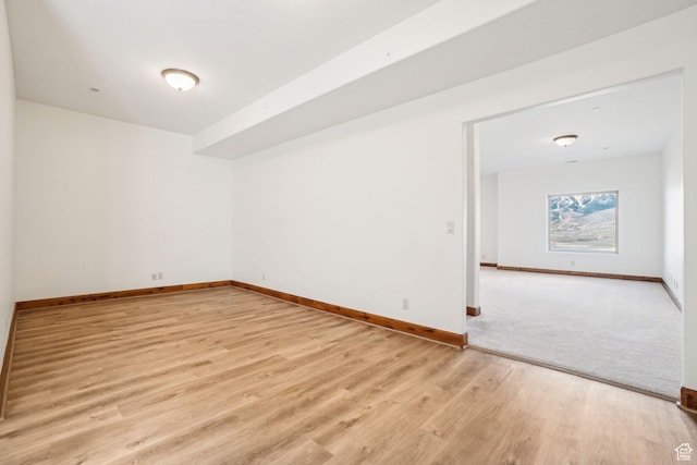 12221 Ross Creek Dr Unit 137, Kamas, UT 84036 - unfurnished room with baseboards and light wood-style floors
