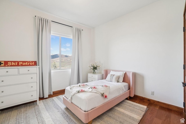 12221 Ross Creek Dr Unit 137, Kamas, UT 84036 - bedroom with baseboards and wood finished floors
