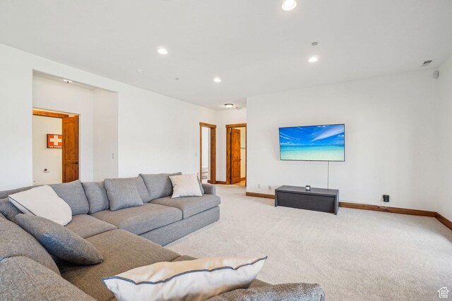 12221 Ross Creek Dr Unit 137, Kamas, UT 84036 - living room with carpet floors, baseboards, and recessed lighting