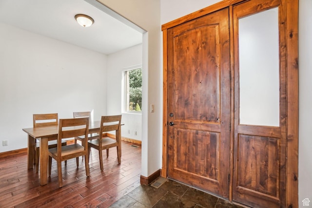 12221 Ross Creek Dr Unit 137, Kamas, UT 84036 - dining space with dark wood finished floors, visible vents, and baseboards