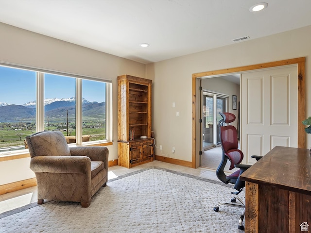 home office with a mountain view, baseboards, visible vents, and recessed lighting