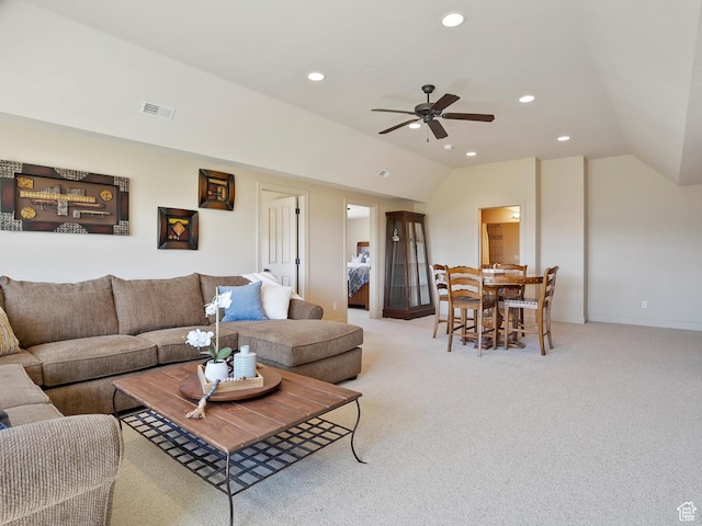 living room featuring recessed lighting, ceiling fan, visible vents, vaulted ceiling, and light colored carpet