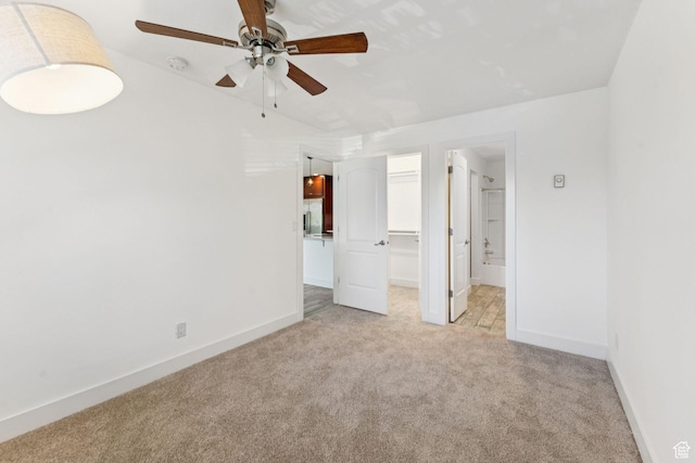 2025 Canyons Resort Dr Unit D4, Park City, UT 84098 - unfurnished bedroom with carpet flooring, a spacious closet, ensuite bathroom, a closet, and a ceiling fan