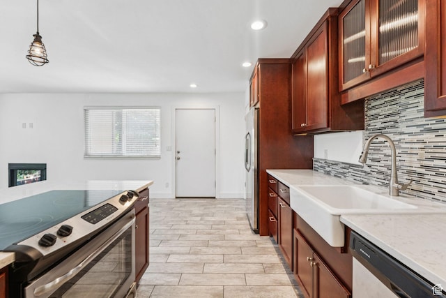 2025 Canyons Resort Dr Unit D4, Park City, UT 84098 - kitchen with stainless steel appliances, backsplash, recessed lighting, pendant lighting, and glass insert cabinets
