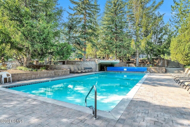 2025 Canyons Resort Dr Unit D4, Park City, UT 84098 - view of swimming pool featuring a fenced backyard and a patio area