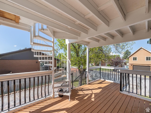 wooden deck featuring stairs